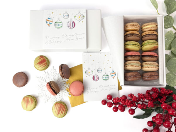 Christmas macaron gift Box of 12 handcrafted French macarons in six festive flavours by Florian Poirot.