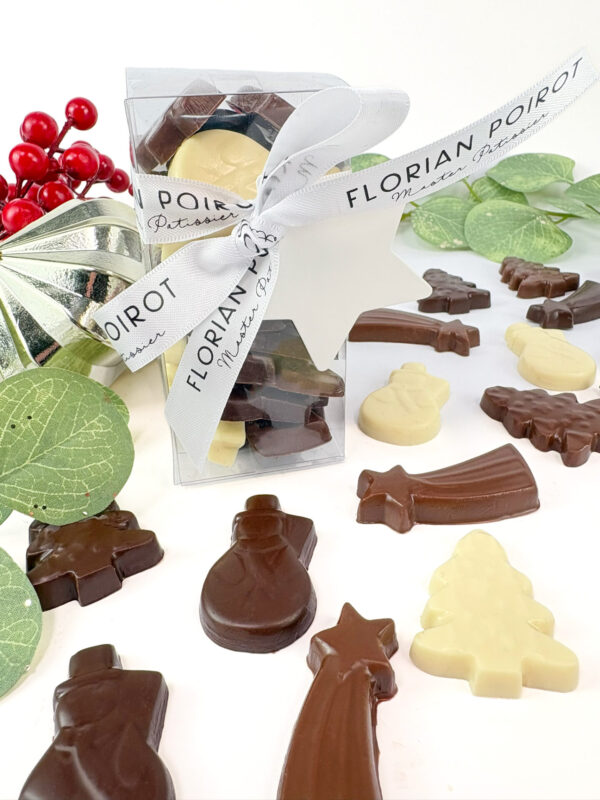 Christmas chocolate assortment in a gift box featuring white, milk and dark chocolate
