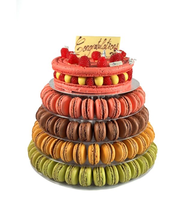 Lower tiers macaron tower with handmade French macarons and celebration cake by Florian Poirot, perfect for weddings and special occasions.