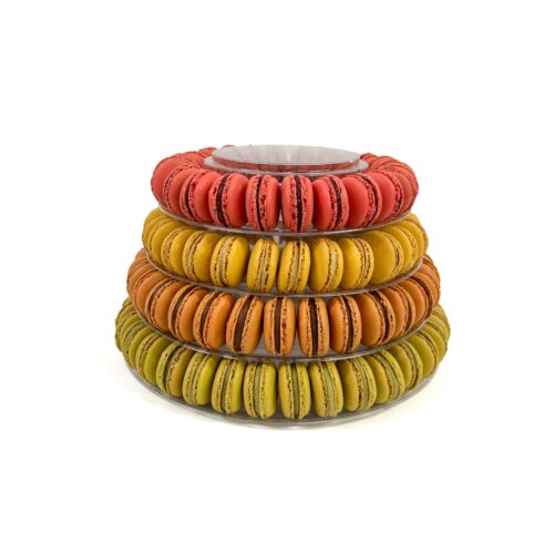 Lower tiers macaron tower with handmade French macarons and celebration cake by Florian Poirot, perfect for weddings and special occasions.