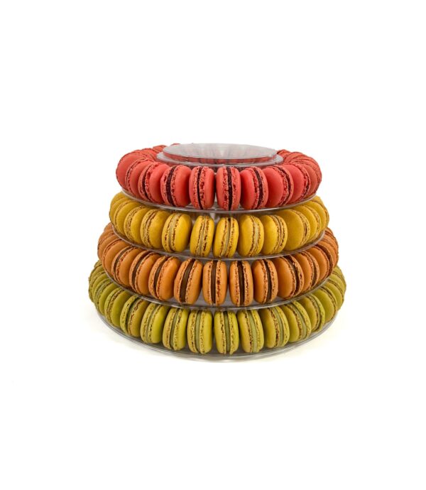 Lower tiers macaron tower with handmade French macarons and celebration cake by Florian Poirot, perfect for weddings and special occasions.