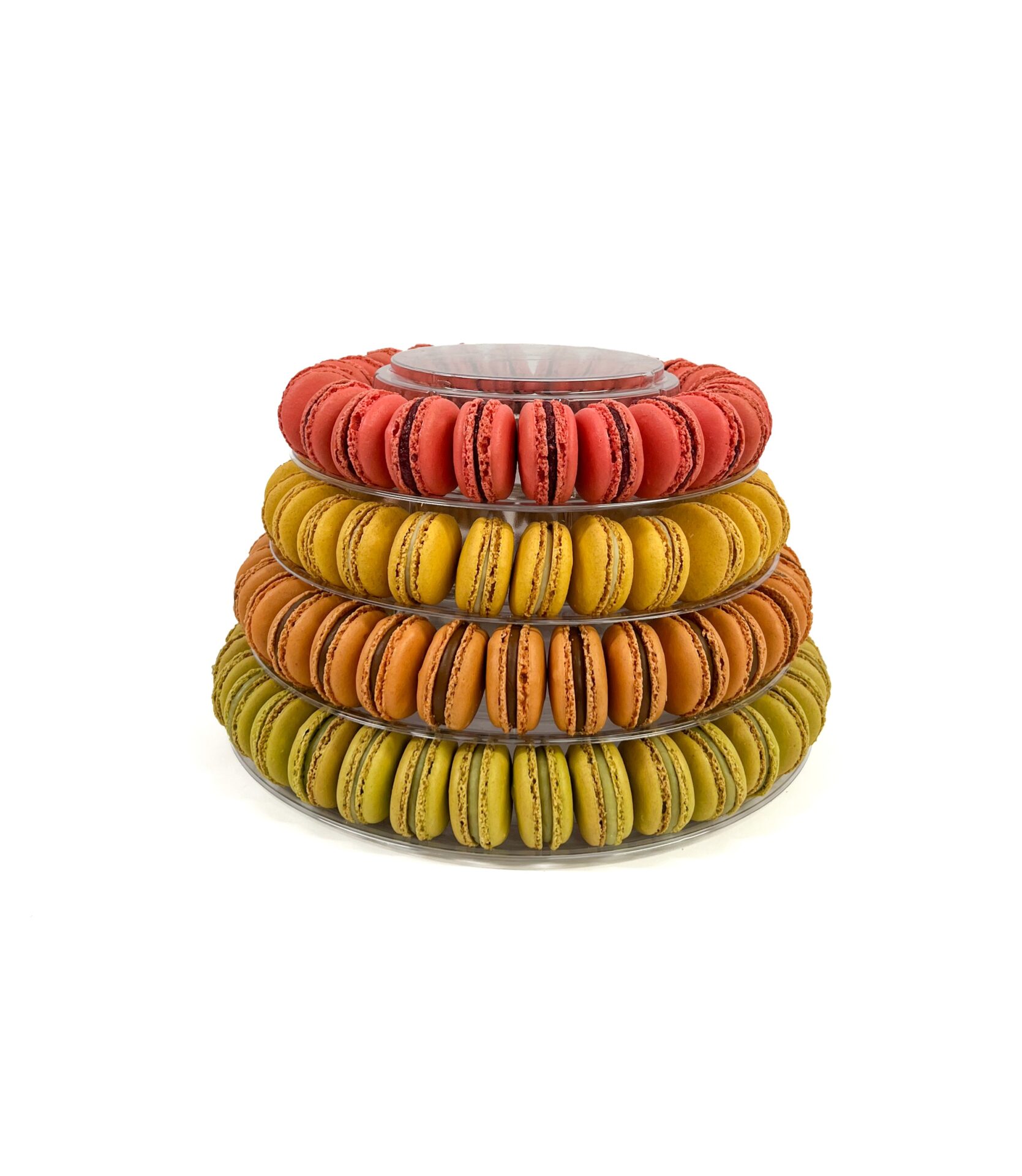 Lower tiers macaron tower with handmade French macarons and celebration cake by Florian Poirot, perfect for weddings and special occasions.