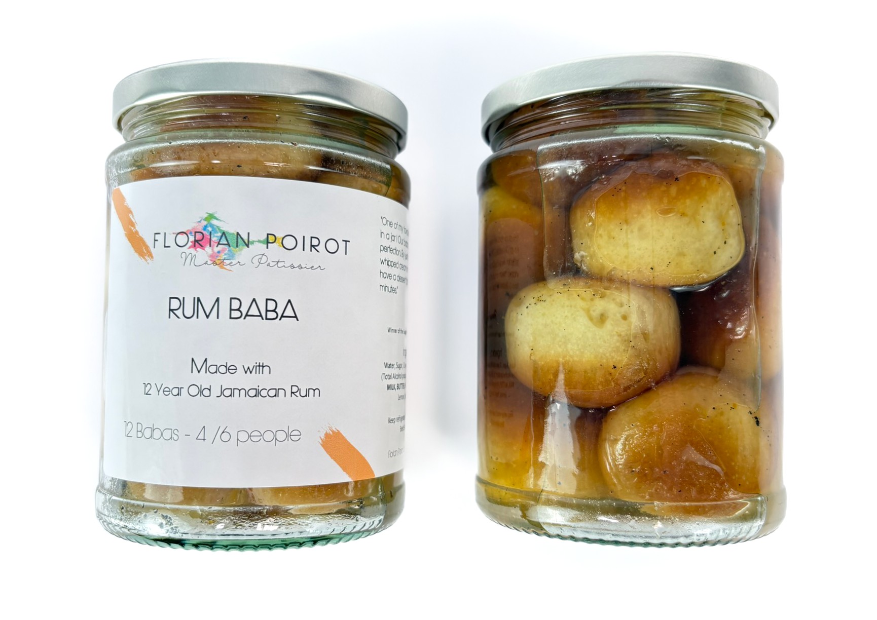 Traditional French Rum Baba desserts soaked in 12-year-old Jamaican rum syrup in a jar, ready to serve with whipped cream or custard.