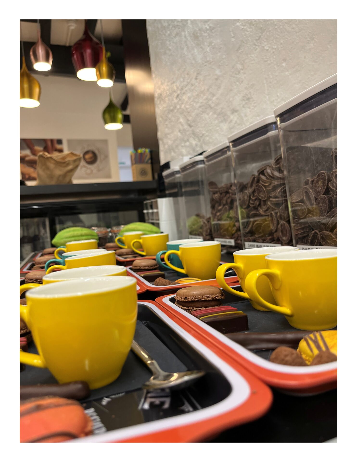 Café gourmand tasting event York featuring French macarons, chocolates and SNACKING